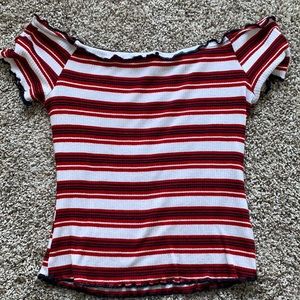 Very fitting top fits just like a medium